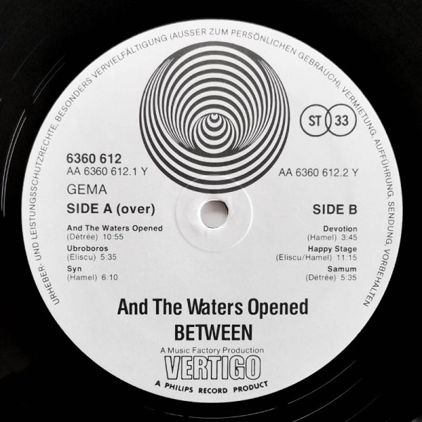 Between • And The Waters Opened